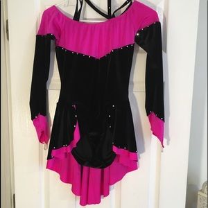 A pink and black figure skating dress.